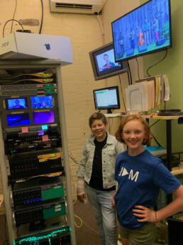 Two Young Adults Working at CATV