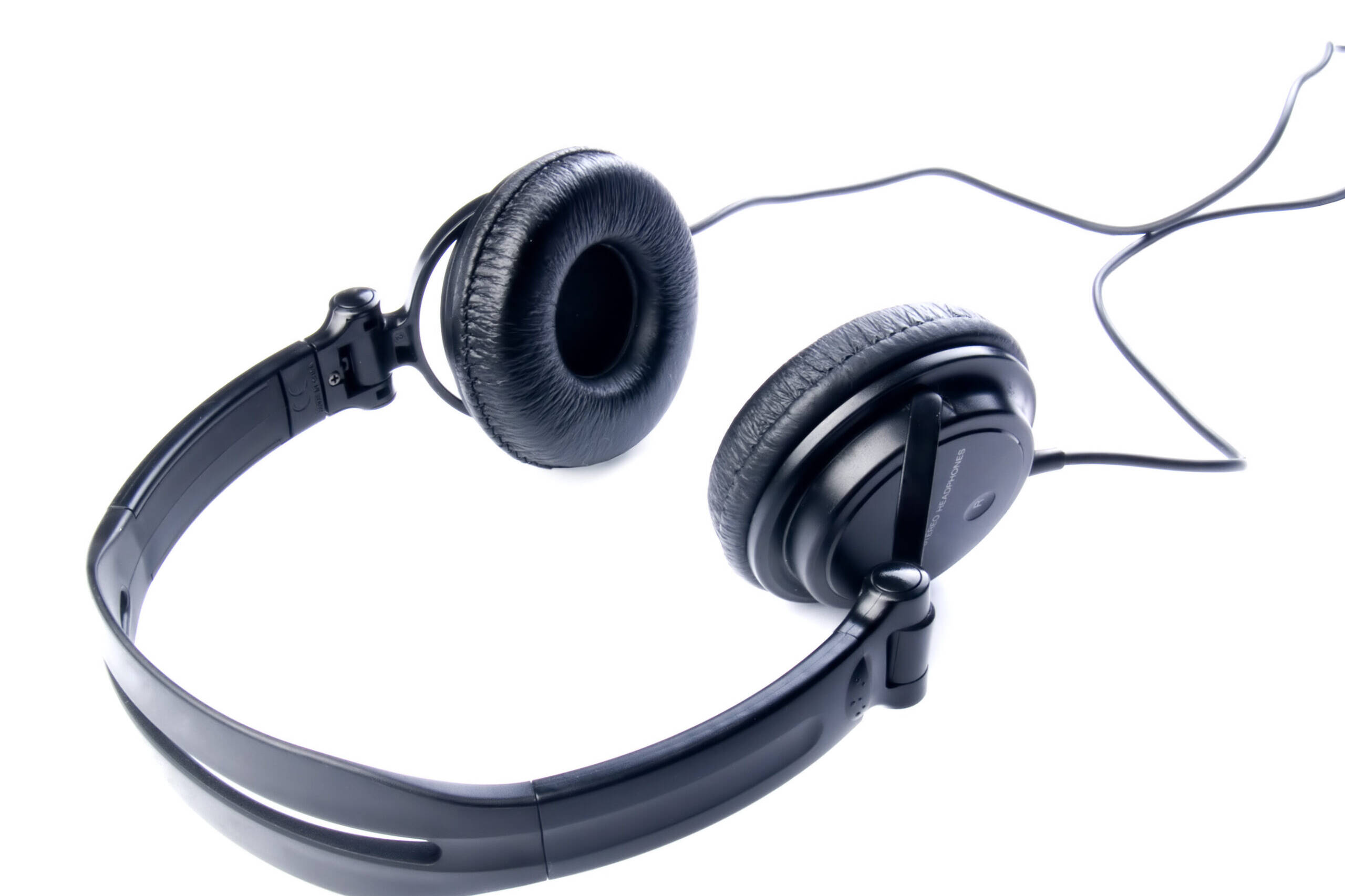 black headphones isolated on white SBI 300145586